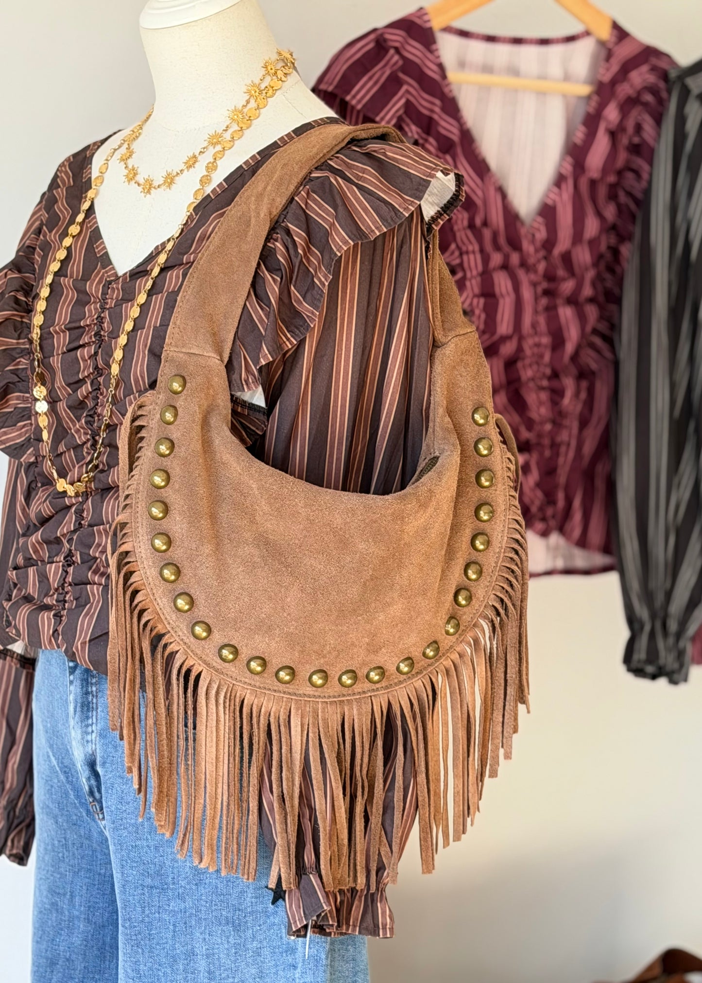 mala pele franjas tachas douradas kakau store