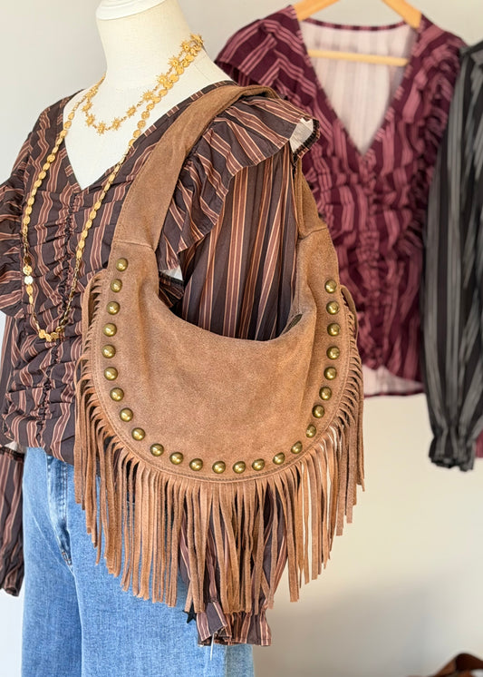 mala pele franjas tachas douradas kakau store